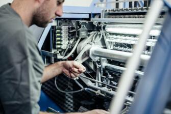 Offene Fadenheftung bei F&W Druck- und Mediencenter Traunstein