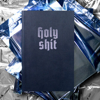 Freirückenbroschüre mit schwarzem Papier als Umschlag bedruckt